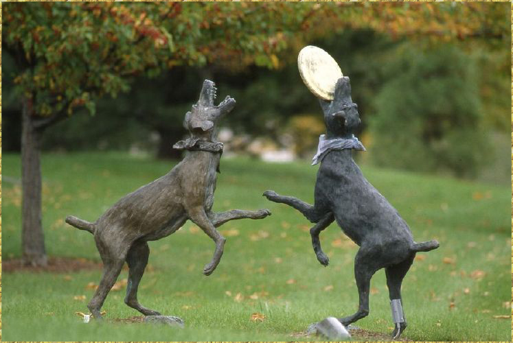 Dogs Playing Frisbee